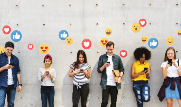 Young people using social media apps.